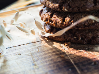 oatmeal cookies oats and milk on a wooden background