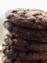 oatmeal cookies oats and milk on a wooden background