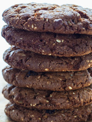 oatmeal cookies oats and milk on a wooden background