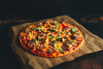 Pizza and tableware   on black background