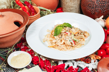 Pasta with cream sauce with chicken and rosemary