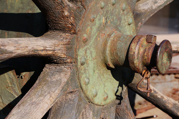 Vintage old cannon wooden wheel close up