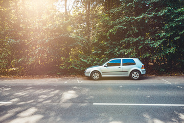 Obraz na płótnie Canvas car on the road at rural forest