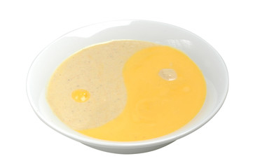 Wheat porridge with butter in the white bowl on white isolated background