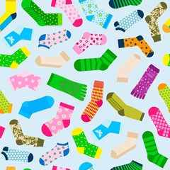 Fashion colorful socks vector seamless pattern. Bright yellow, green and pink dotted and stripped socks with geometric ornament on light blue background