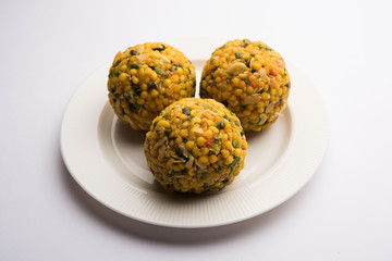 Jumbo Boondi Laddu mixed with dry fruits also know as laddoo/ ladoo/ laddo or Sweet dumplings made during festivals or weddings