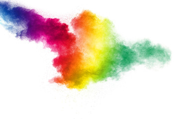Colorful powder explosion on white background. Abstract pastel color dust particles splash.