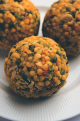 Jumbo Boondi Laddu mixed with dry fruits also know as laddoo/ ladoo/ laddo or Sweet dumplings made during festivals or weddings