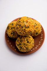 Jumbo Boondi Laddu mixed with dry fruits also know as laddoo/ ladoo/ laddo or Sweet dumplings made during festivals or weddings