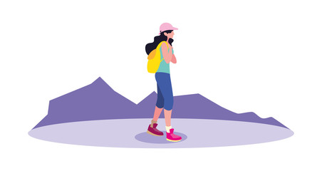 young woman backpacker in mountain landscape