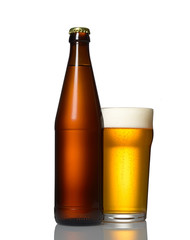 Bottle of beer and a glass on a white background