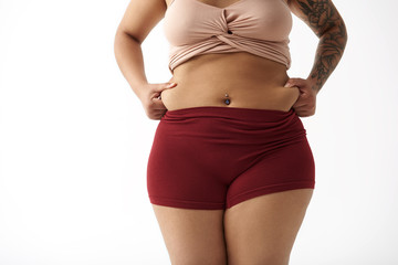 Fototapeta premium Afro American plus size female posing for camera