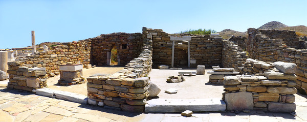view of ancients houses in the archaeological city of Delos Island, near Mykonos, beautiful Cycladic island, in the heart of the Aegean Sea