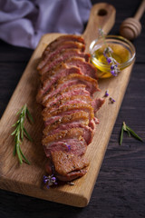 Duck breast on serving board. Duck breast fillet steak