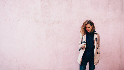 Background with young woman drinking coffee