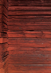 Alte rote Blockhaus Fassade in Schweden.  Hintergrund. Background. Old red color wooden facade of swedish farm house. 