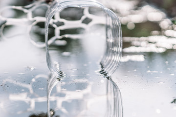 transparent Plastic and water reflection. Abstract concept