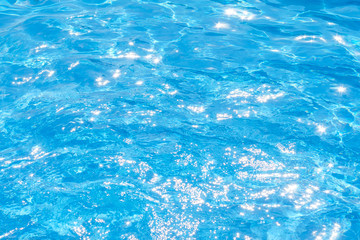 Fototapeta na wymiar blue water pool background texture abstraction solar bright light