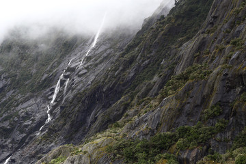 Fototapeta na wymiar Waterfall at Franz Josef Glacier South Island New Zealand