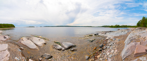 Islands in Lake Ladoga. Beautiful landscape - water, pines and boulders.