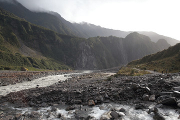 Green valley,moss and stones and Mountain in Franz Josef Glacier, New Zealand South Island