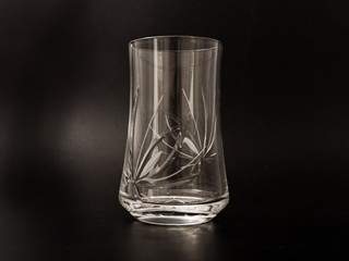 crystal glass cup on a black background