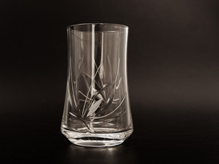 crystal glass cup on a black background