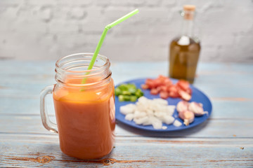 view of a fresh pitcher of red gazpacho