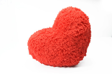 Red heart pillow on white background 