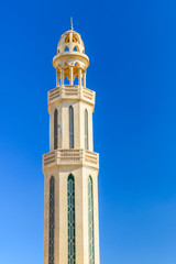 Obraz premium Minaret of the mosque in Hurghada city, Egypt