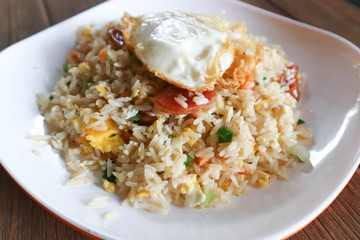 stir-fried rice with deep fried sausage and egg