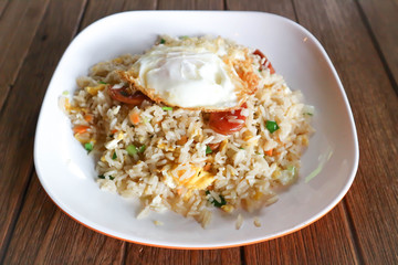 stir-fried rice with deep fried sausage and egg