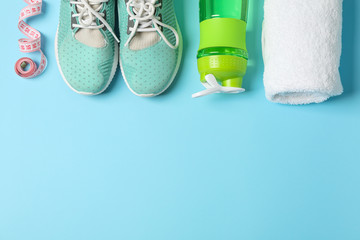 Flat lay composition with loss weigh accessories on color background