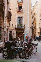 Bikes and tourists in the gothic quarter barcelona, Spain