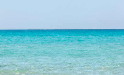 Beautiful sea with turquoise water and golden beach in Gallipoli, Salento.