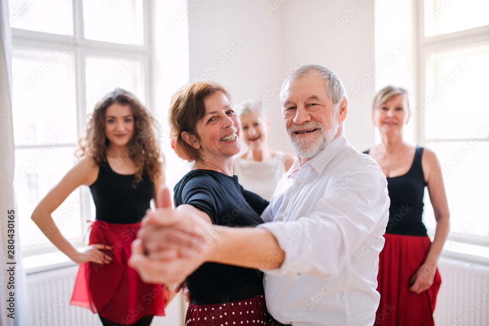 Sticker group of senior people in dancing class with dance teacher.