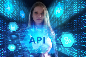 Obraz premium The concept of business, technology, the Internet and the network. A young entrepreneur working on a virtual screen of the future and sees the inscription: API