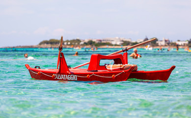 View of an italian lifeguard boat in the sea.