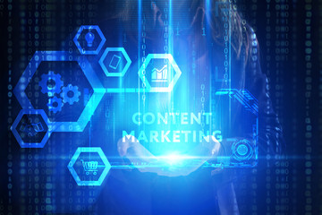 The concept of business, technology, the Internet and the network. A young entrepreneur working on a virtual screen of the future and sees the inscription: Content marketing