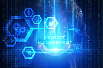 Fototapeta premium The concept of business, technology, the Internet and the network. A young entrepreneur working on a virtual screen of the future and sees the inscription: Project management