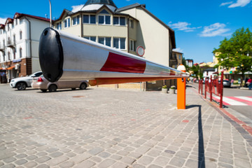 city car automatic barrier near the road covering private territory
