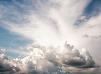 Natural looking afternoon sky with beautiful summer rain cumulus and stratus clouds with copypaste for design background