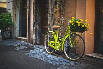 Bicycle parked on the street in Rome, Italy.