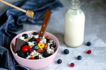 Breakfast with cottage cheese and berries. Oatmeal with chocolate and berries
