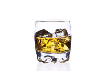 A glass of whiskey with ice cubes on a white background.