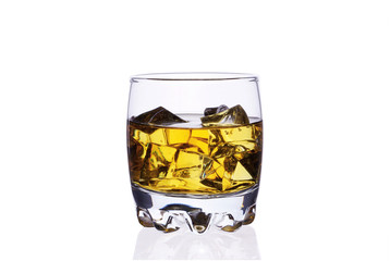A glass of whiskey with ice cubes on a white background.