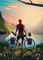 Cyclist in the mountains staring at the lake