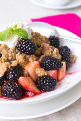 Fresh fruits with granola and yoghurt