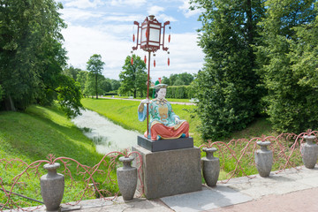 statue on the Chinese bridge in Alexander Park in Tsarskoye Selo
