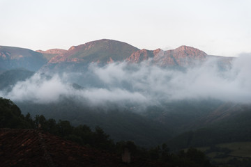 A cloudy, mountain sunrise in Asturias, Spain during summer. 